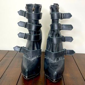 Black leather booties w/ buckles.